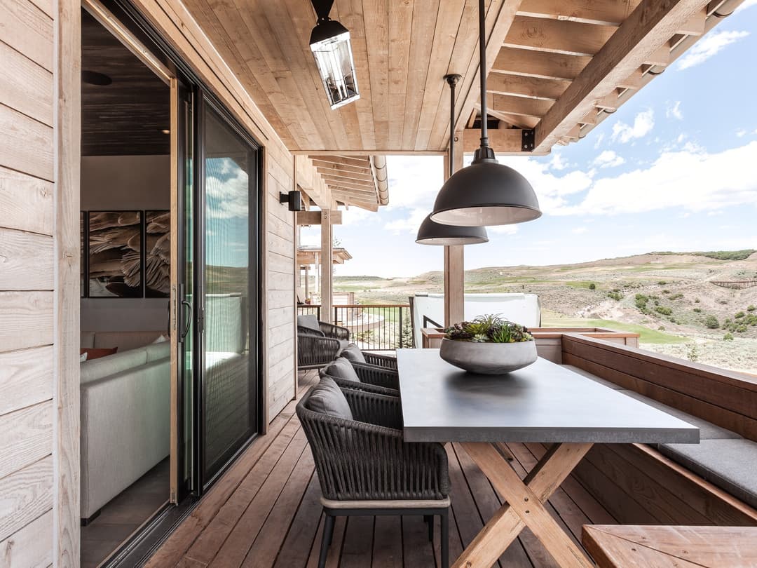 Contemporary hillside deck with panoramic view